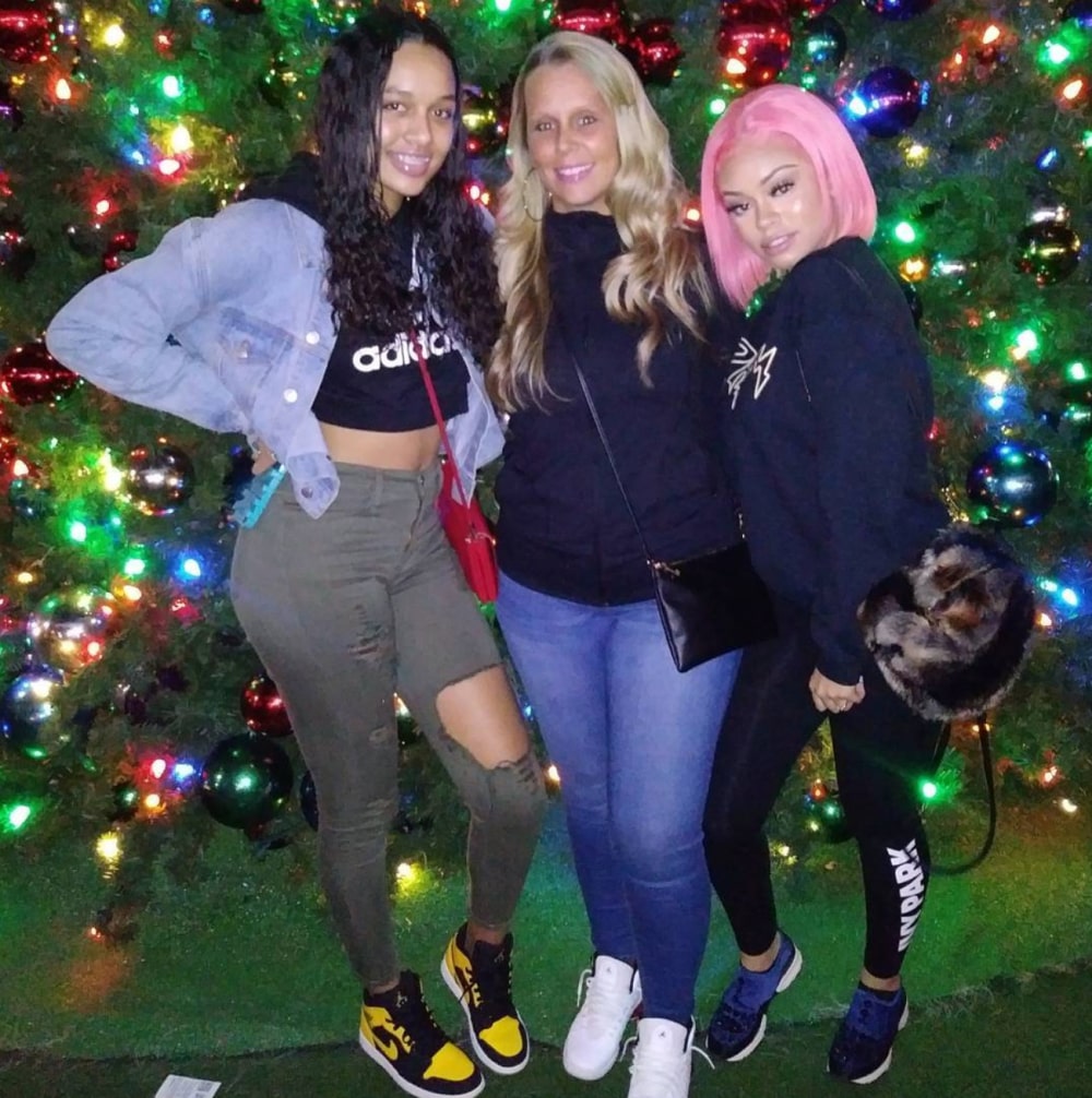 A photo of Misti Pitts with her daughters Latto and Brooklyn Nikole